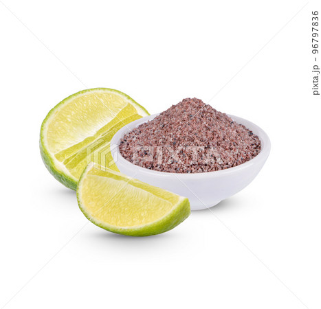 Lemon and Black Himalayan Salt (Namakh shell salt) In a separate white cup isolated on white background 96797836