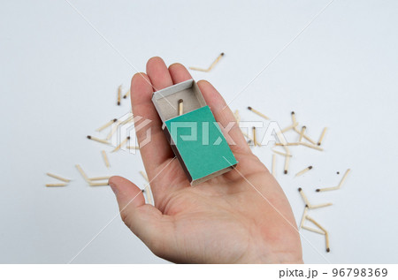 Last chance concept. The last match in the box against the background of broken matches 96798369