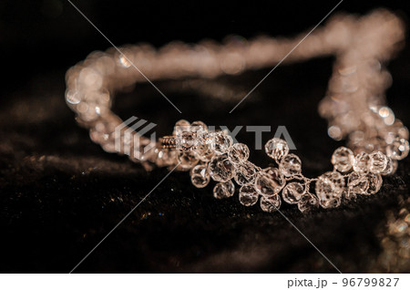 Necklace with stones on black background 96799827
