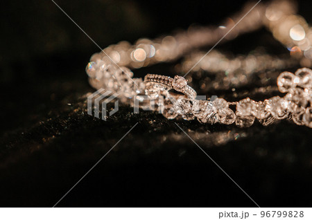Necklace with stones on black background Necklace with stones on black background 96799828