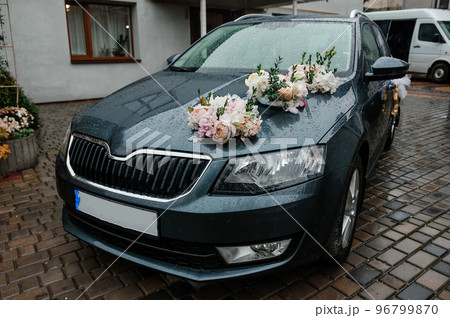 Car decoration for a wedding. Decorations on the car of the