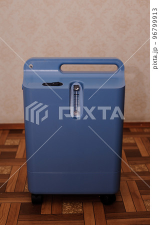 Oxygen concentrator. Oxygen generator. Medical equipment oxygen apparatus for breathing. Treatment of severe patients with impaired respiratory function Oxygen concentrator. Oxygen generator. Medical equipment oxygen apparatus for breathing. Treatment of severe patients with impaired respiratory function 96799913
