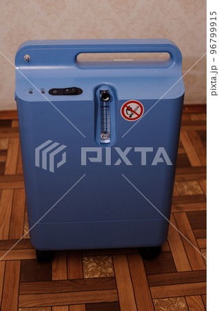 Oxygen concentrator. Oxygen generator. Medical equipment oxygen apparatus for breathing. Treatment of severe patients with impaired respiratory function Oxygen concentrator. Oxygen generator. Medical equipment oxygen apparatus for breathing. Treatment of severe patients with impaired respiratory function 96799915