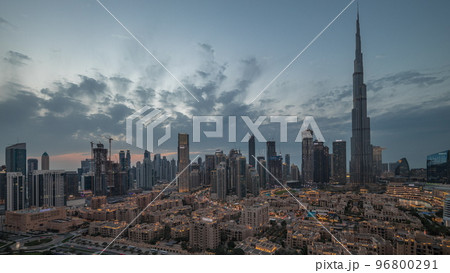 Dubai Downtown day to night transition timelapse with tallest skyscraper and other towers Dubai Downtown day to night transition timelapse with tallest skyscraper and other towers 96800291