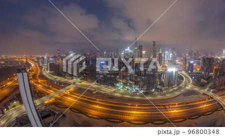 Panoramic skyline of Dubai with business bay and downtown district night to day timelapse. Panoramic skyline of Dubai with business bay and downtown district night to day timelapse. 96800348