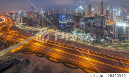Panoramic skyline of Dubai with business bay and downtown district night to day timelapse. Panoramic skyline of Dubai with business bay and downtown district night to day timelapse. 96800349