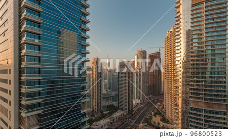 Panoramic view of the Dubai Marina and JBR area and the famous Ferris Wheel aerial morning timelapse 96800523