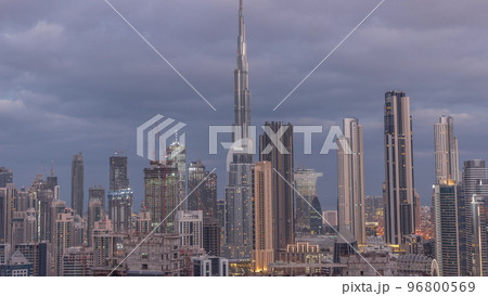Panoramic skyline of Dubai with business bay and downtown district night to day timelapse. Panoramic skyline of Dubai with business bay and downtown district night to day timelapse. 96800569
