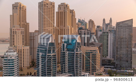 Dubai Marina skyscrapers and JBR district with luxury buildings and resorts aerial timelapse Dubai Marina skyscrapers and JBR district with luxury buildings and resorts aerial timelapse 96800613