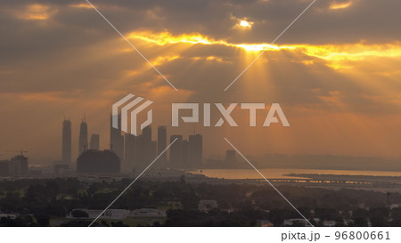 Sunrise over Dubai Creek Harbor with skyscrapers and towers under construction aerial timelapse Sunrise over Dubai Creek Harbor with skyscrapers and towers under construction aerial timelapse 96800661