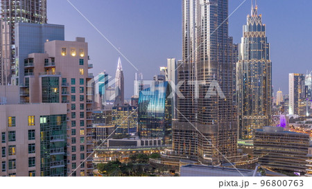 Aerial view of Dubai International Financial Centre district skyscrapers day to night timelapse 96800763