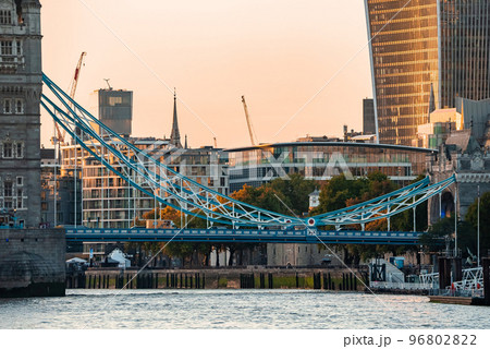 Iconic Tower Bridge connecting Londong with Southwark on the Thames River. Close up view of the details of the bridge. Iconic Tower Bridge connecting Londong with Southwark on the Thames River. Close up view of the details of the bridge. 96802822