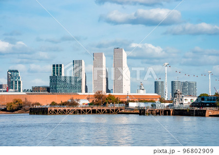 London, UK. May 10, 2022. View of the Emirates Cable car in London England across river Thames. London, UK. May 10, 2022. View of the Emirates Cable car in London England across river Thames. 96802909