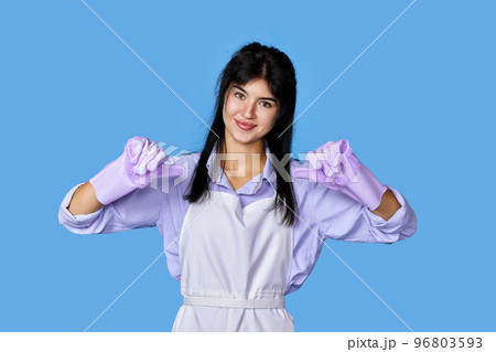 woman in rubber gloves pointing oneself with fingers woman in rubber gloves pointing oneself with fingers 96803593