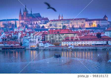 Charles bridge at dramatic evening with doves, Medieval Prague, Czech Republic 96810172