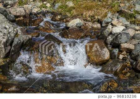 Alpine river in Engadin Valley at sunrise, Graubunden alps, Grisons, Switzerland Alpine river in Engadin Valley at sunrise, Graubunden alps, Grisons, Switzerland 96810236