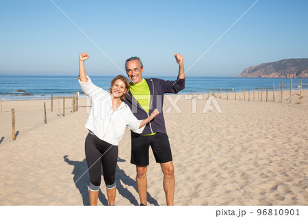 Portrait of aged couple on blue sea background Portrait of aged couple on blue sea background 96810901
