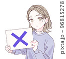 ×のボードを持つ若い女性 96815278