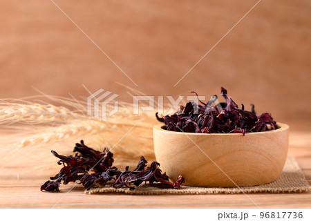 Dry roselle (Hibiscus sabdariffa) in bowl, Food coloring and ingredient in beverage 96817736