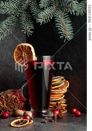Hot Christmas drink with ingredients. Hot Christmas drink with ingredients. 96819092