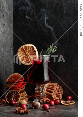 Hot Christmas drink with ingredients. Hot Christmas drink with ingredients. 96819093