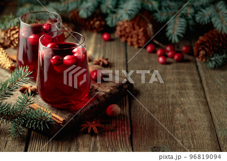 Christmas drink with spices and cranberries. Christmas drink with spices and cranberries. 96819094
