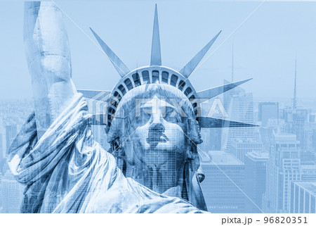 Double exposure of Manhattan skyline in new york city with statue of liberty silhouette 96820351