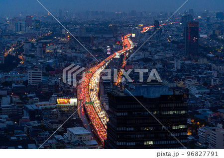 Aerial view of busy cars with traffic jam in the rush hour on highway road street on bridge in Bangkok Downtown, urban city in Asia, Thailand at sunset. Intersection junction. Toll gate in Rama 9 96827791