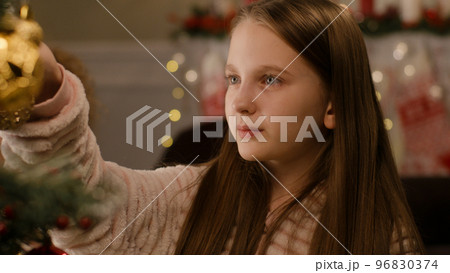 Kid preparing house before Christmas 96830374