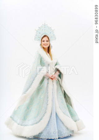 Snow Maiden in a traditional costume with a kokoshnik on a white background.  96830899