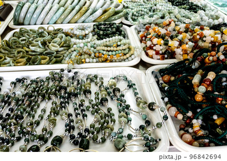 Many jewelry made of stone in a souvenir shop 96842694