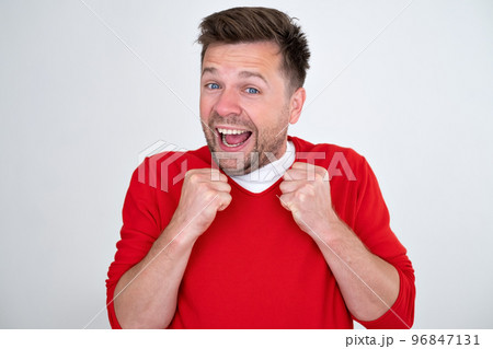 Young handsome man shocked with surprise and amazed expression  96847131