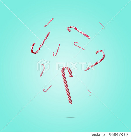 Candy canes levitating in the air on a turquoise background. Christmas minimal concept for new year gift card 96847339