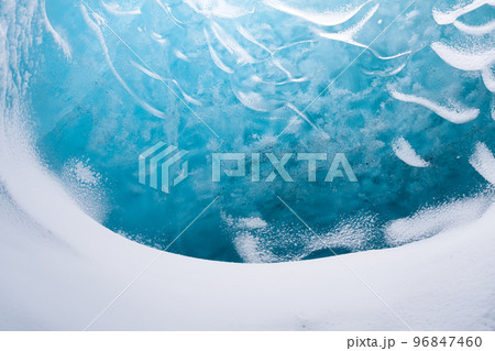 The Ice Cave in Iceland. Crystal Ice Cave. Vatnajokull National Park. Inside view of the ice The Ice Cave in Iceland. Crystal Ice Cave. Vatnajokull National Park. Inside view of the ice 96847460
