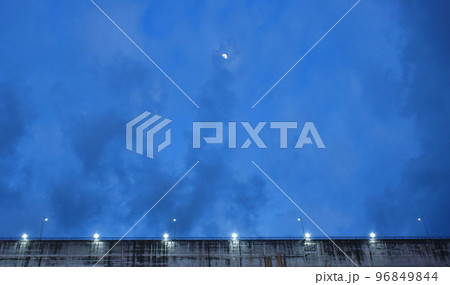 moon over  Khun Dan Prakarn Chon huge concrete dam wall on night in Thailand  moon over  Khun Dan Prakarn Chon huge concrete dam wall on night in Thailand  96849844