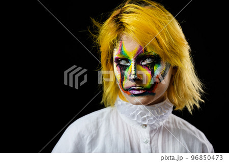 Colorful face art woman 96850473