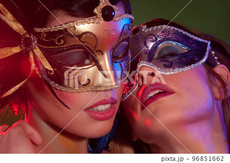 sensual women with colorful carnival mask and makeup 96851662