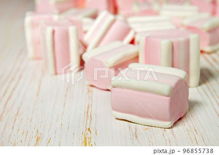 sweet pink marshmallows on white table 96855738