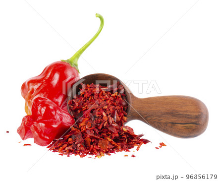 Fresh and dry ground red chili peppers isolated on white background. Capsicum baccatum or Bishop's crown pepper. Fresh and dry ground red chili peppers isolated on white background. Capsicum baccatum or Bishop's crown pepper. 96856179