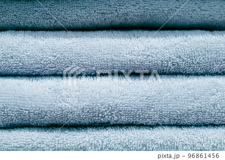 Stack of bath towels. Home textiles for spa treatments. Soft fluffy fabric. Stack of bath towels. Home textiles for spa treatments. Soft fluffy fabric. 96861456