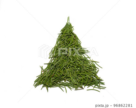 Christmas tree made of Christmas tree needles on a white background. Christmas tree made of Christmas tree needles on a white background. 96862281