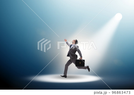 Business people under the spotlight 96863473