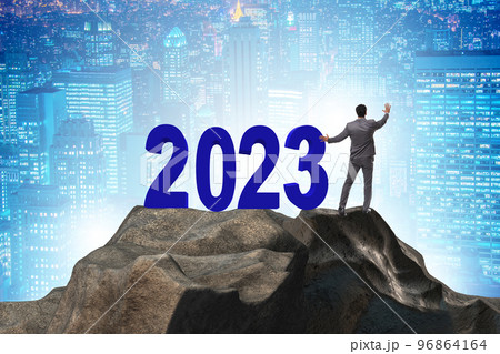 Concept of new year of 2023 with business people Concept of new year of 2023 with business people 96864164