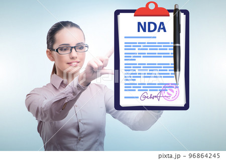 Businesswoman in non disclosure agreement concept Businesswoman in non disclosure agreement concept 96864245