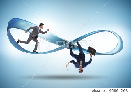 Businessman running on the endless loop 96864268