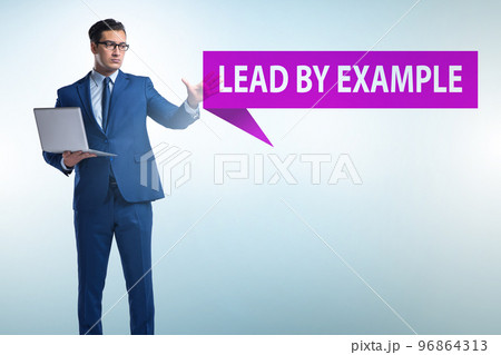 Businessman in lead by example concept Businessman in lead by example concept 96864313