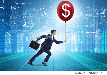 Businessman with dollar balloon concept 96864840