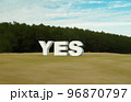 何もない広い草原の真ん中に立つ「YES」と書かれた大きな看板。 96870797