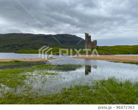 Ardvreck Castle on an island in the middle of a lake, Scotland 96872363