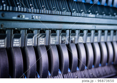 Row of hard disks used for data storage in internet data center Row of hard disks used for data storage in internet data center 96873650